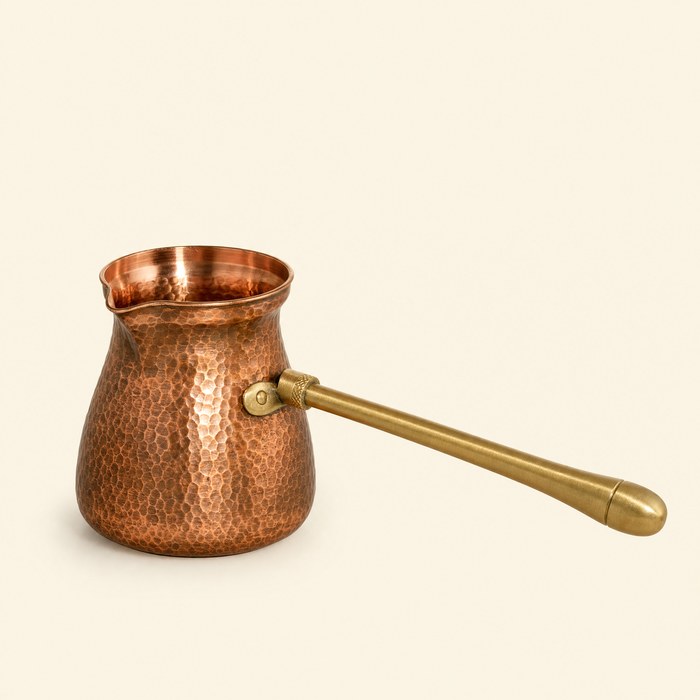 A hammered copper cezve